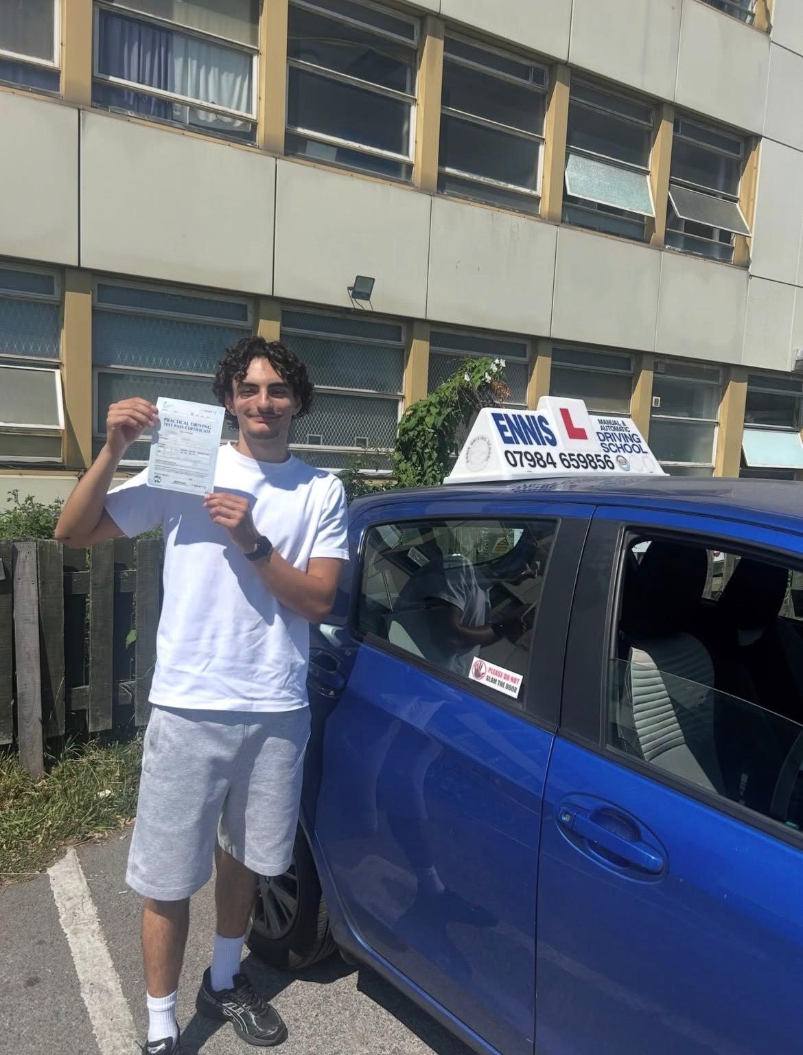 Ennis Driving School pupil celebrating a driving test pass, photo 6